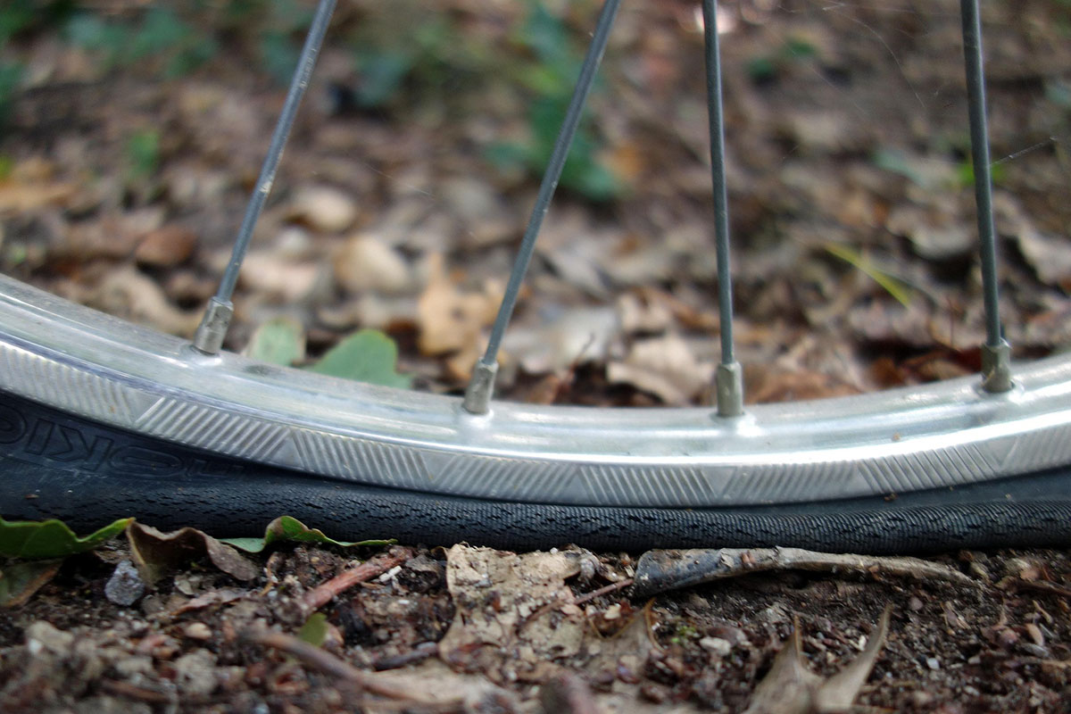 Blue Bikes Zanzibar repairs flat tires